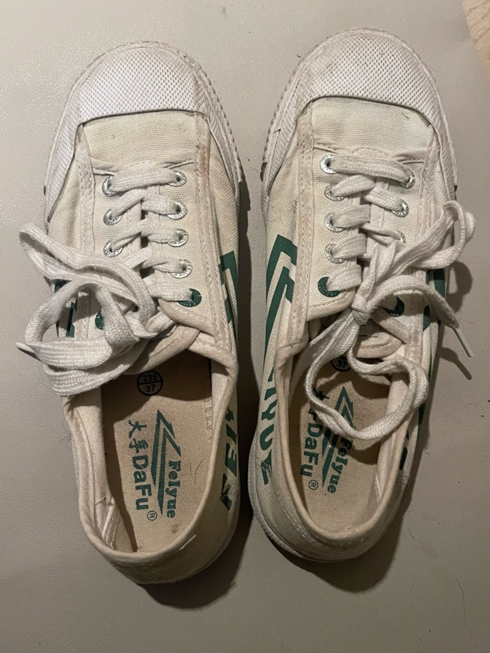 White Canvas Sneakers with Green Accent Stripes